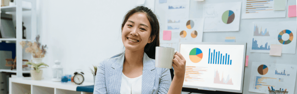 simplesms.org  person-holding-mug-in-office-setting